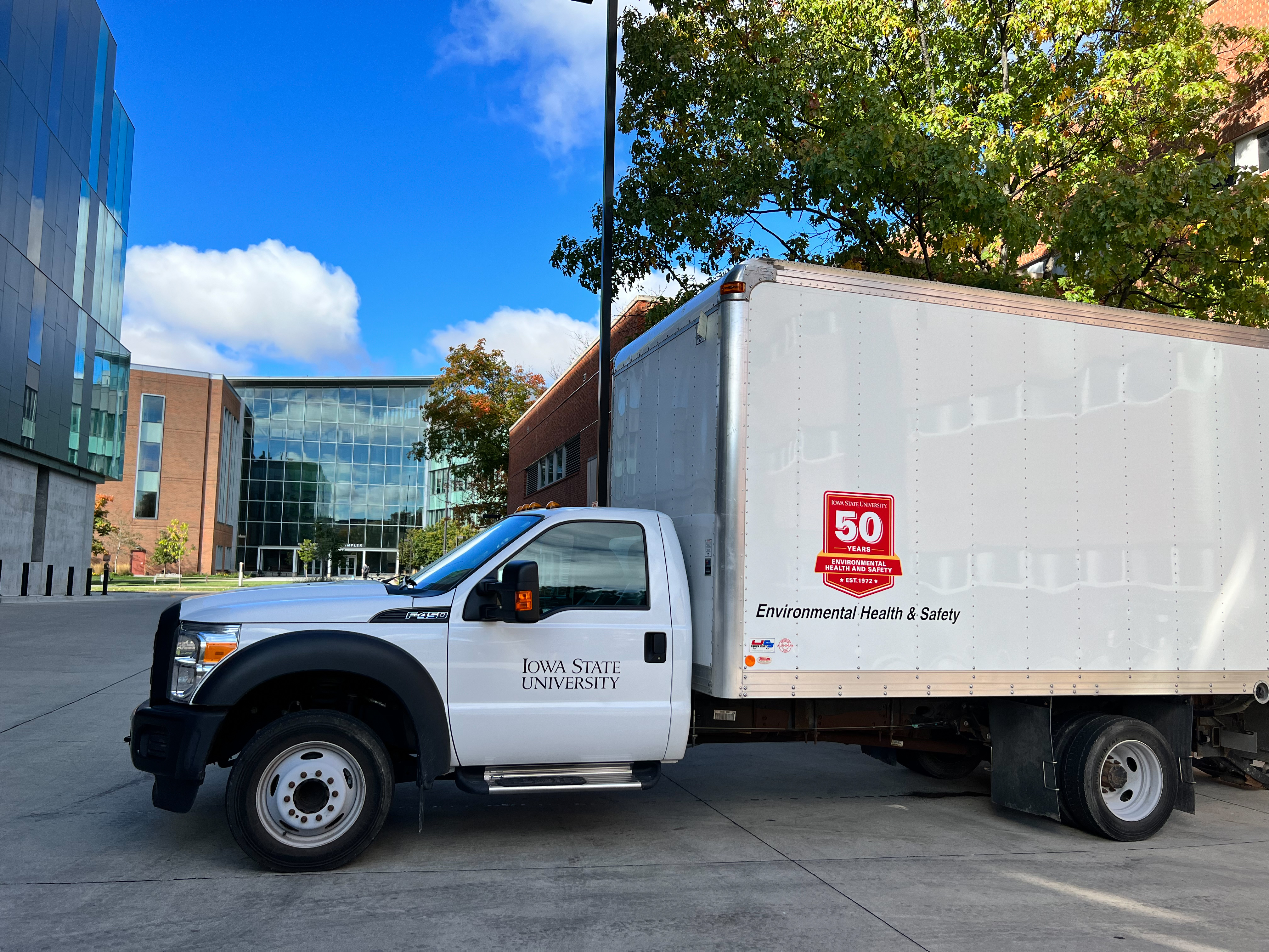 Environmental Health and Safety waste pickup truck on campus