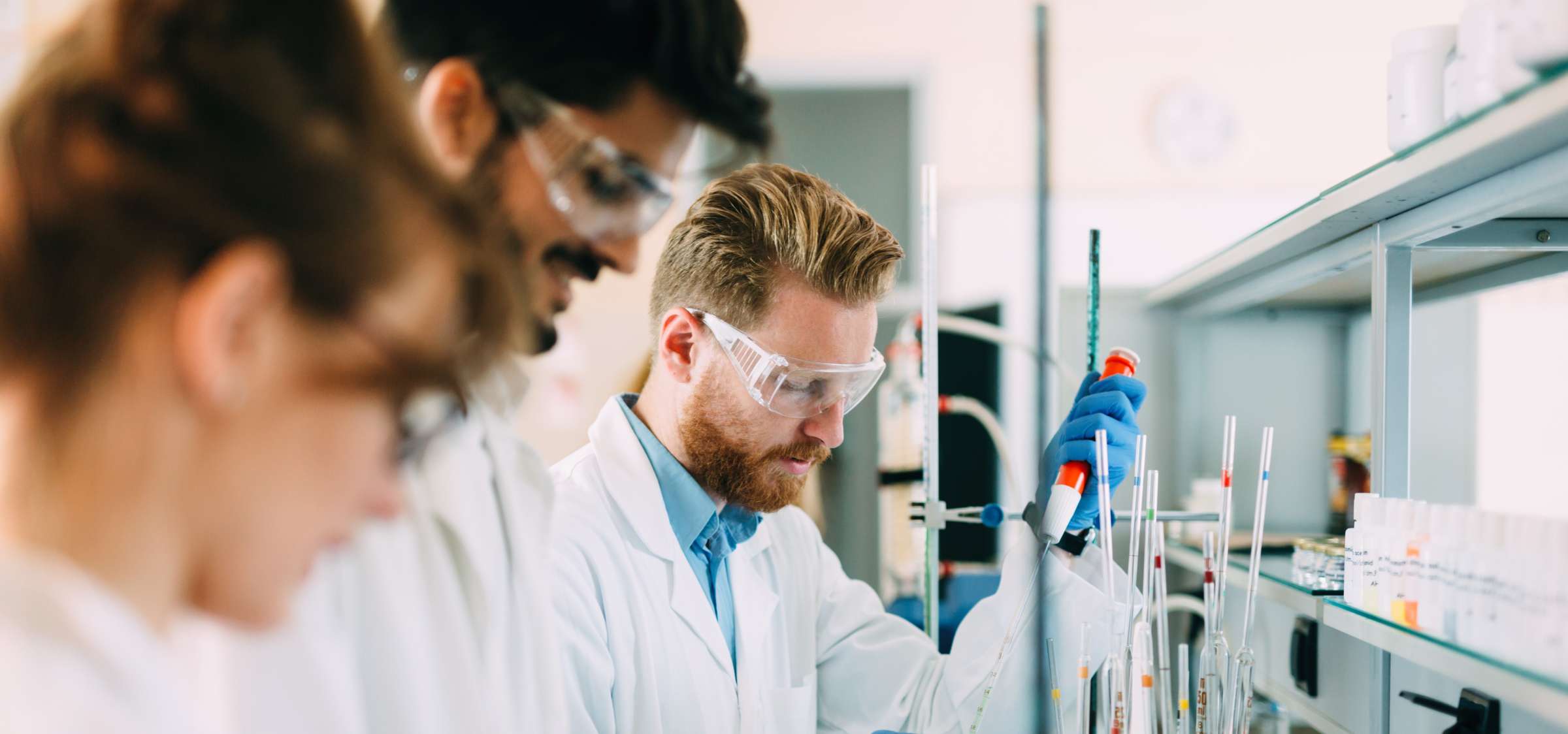 Group of chemistry students working together in a laboratory